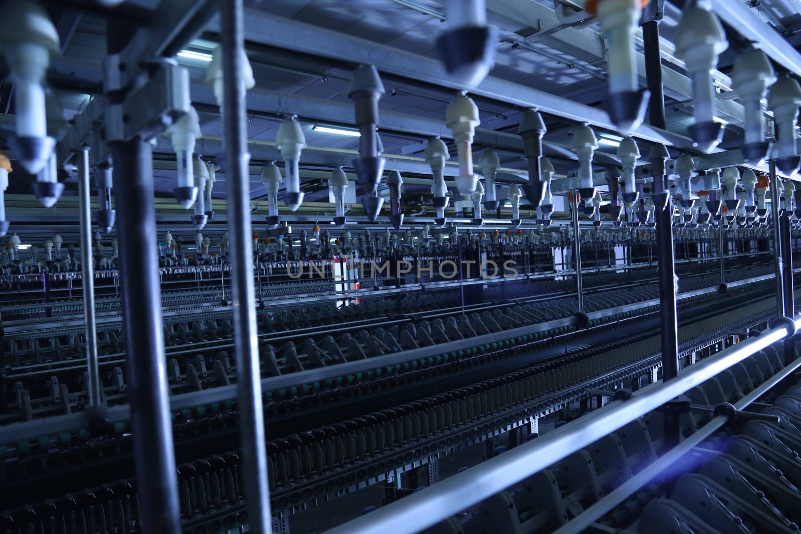 Old machine inside textile factory