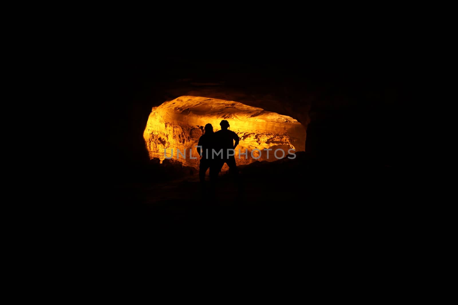 Silhouette of people on hill