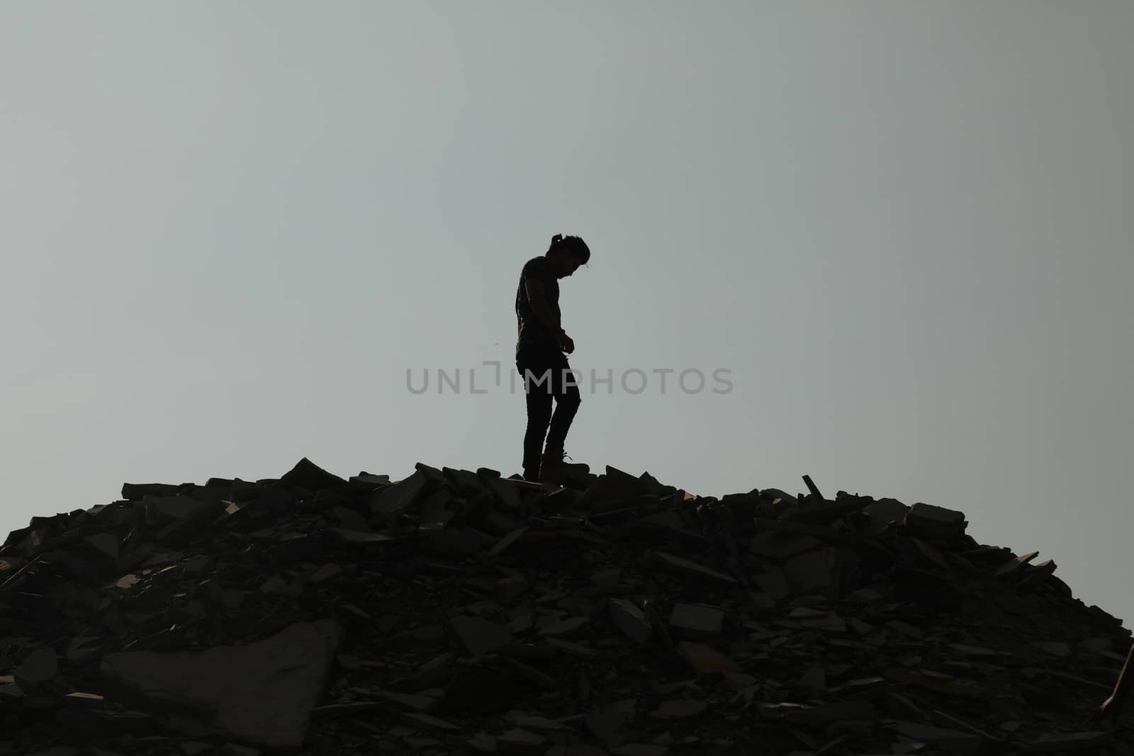 Silhouette of people on hill