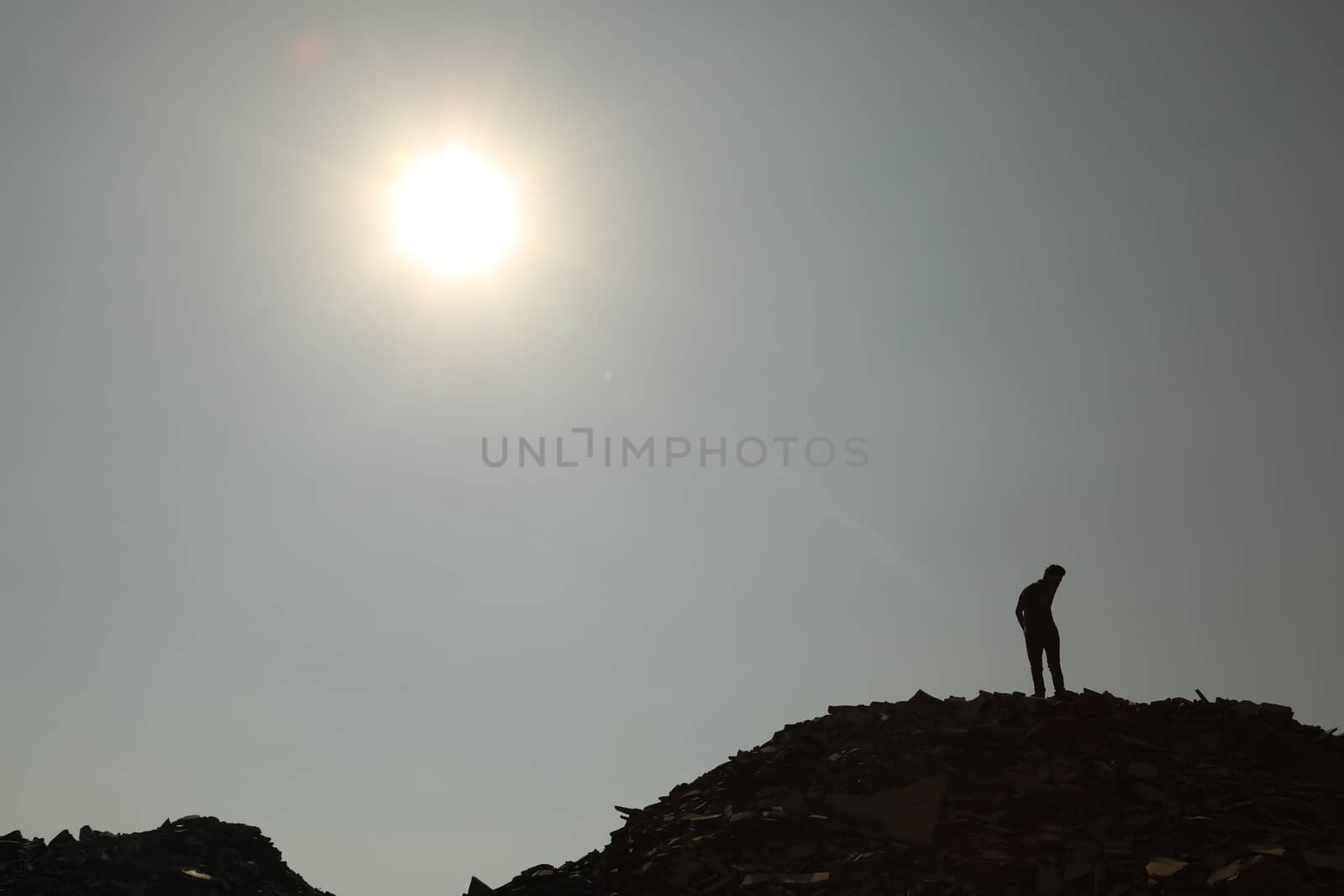 Silhouette of people on hill