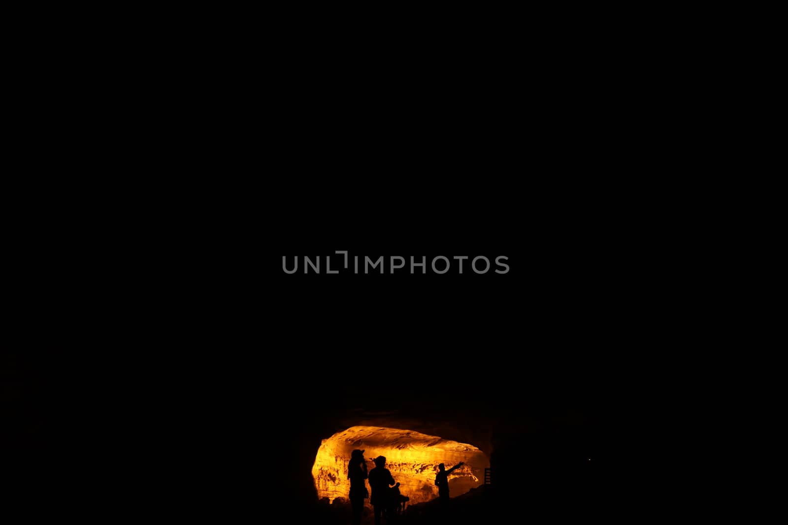Silhouette of people on hill