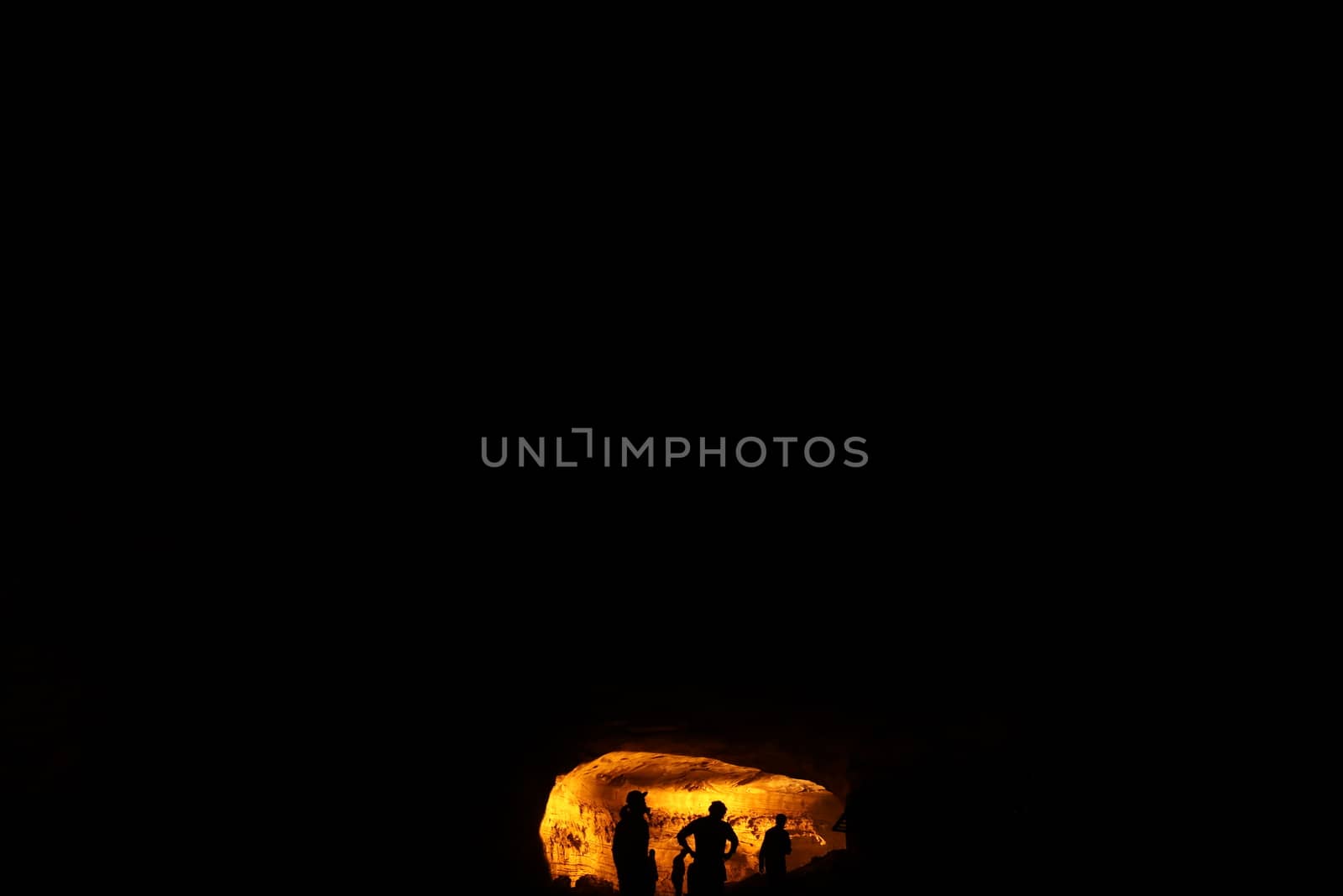 Silhouette of people on hill