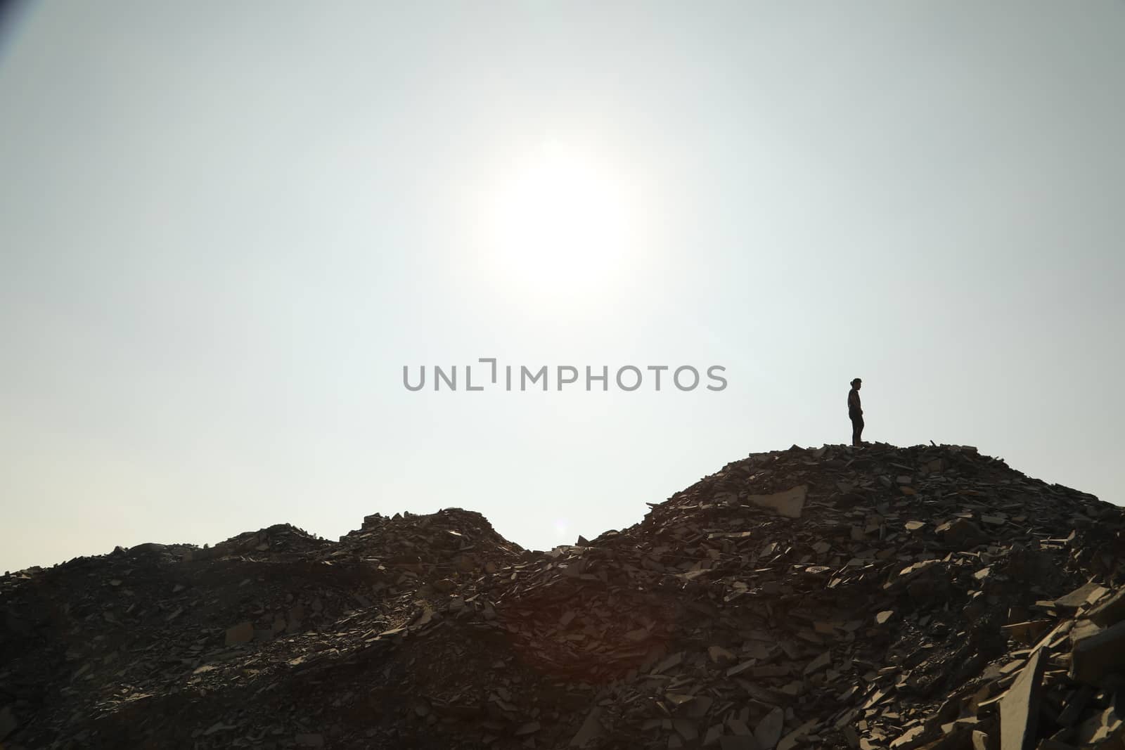 Silhouette of people on hill