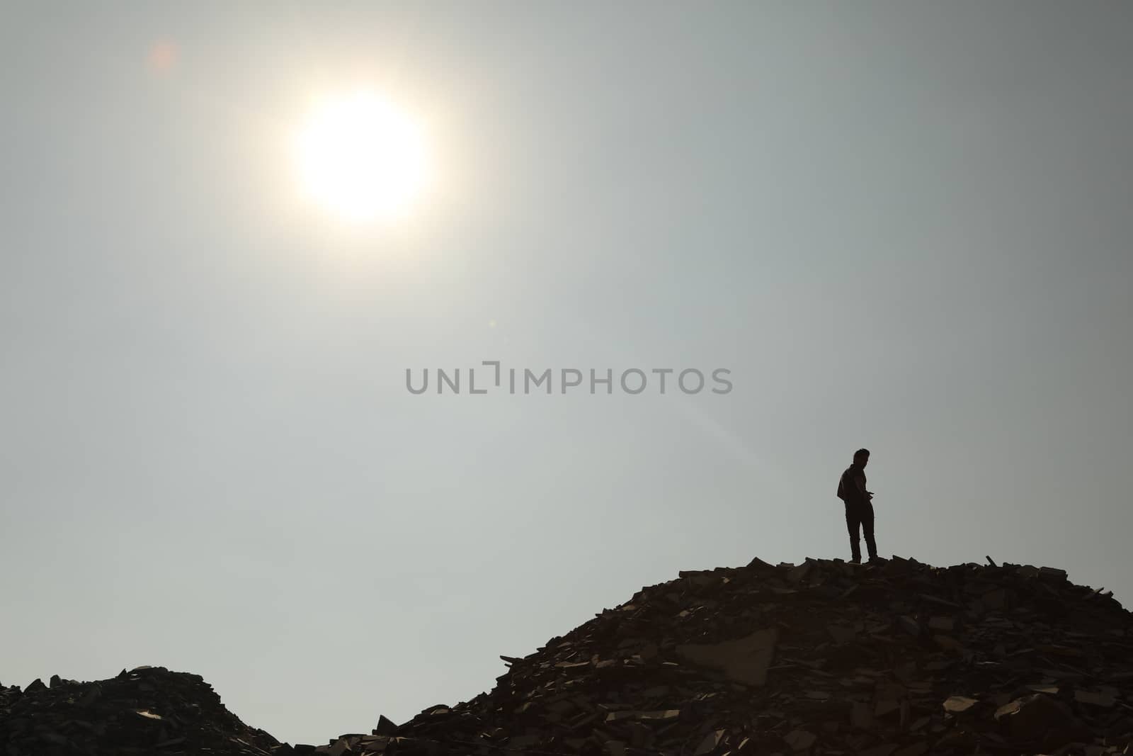 Silhouette of people on hill