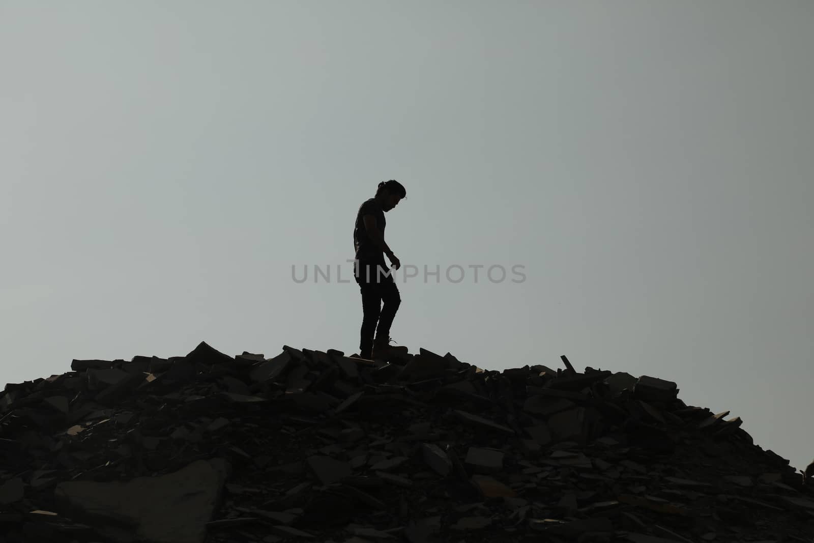 Silhouette of people on hill