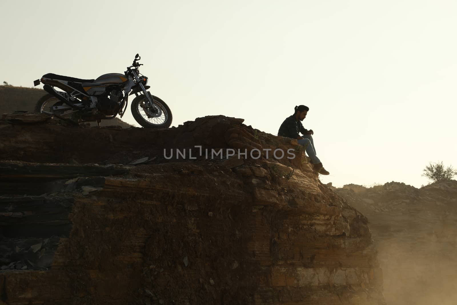 Silhouette of people on hill