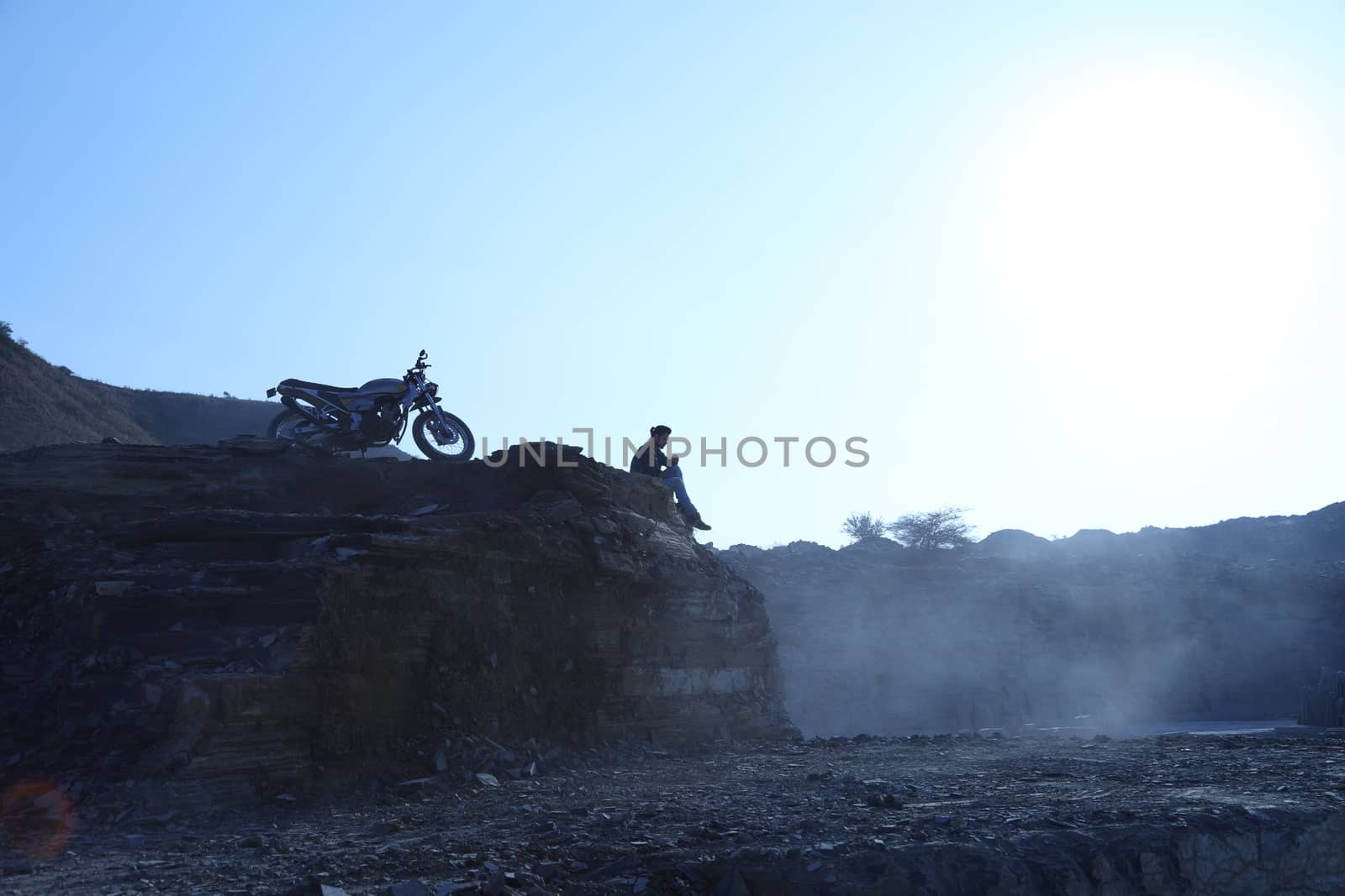 Silhouette of people on hill
