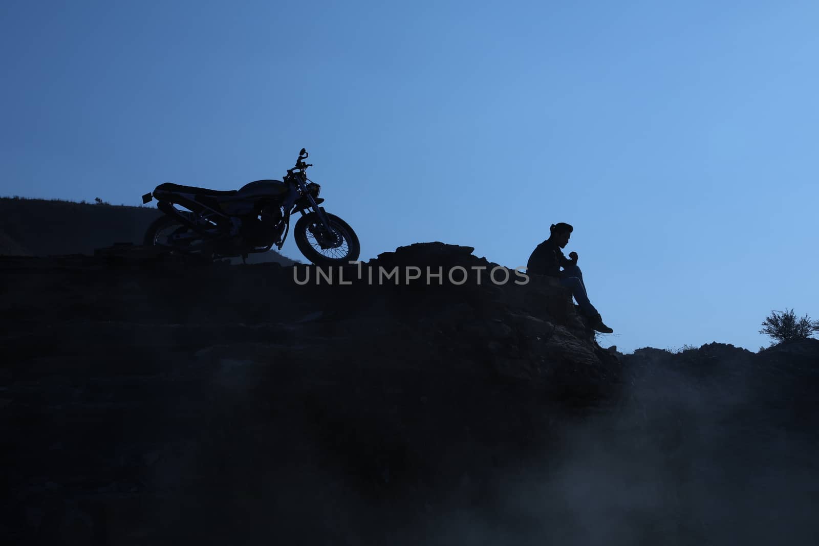 Silhouette of people on hill