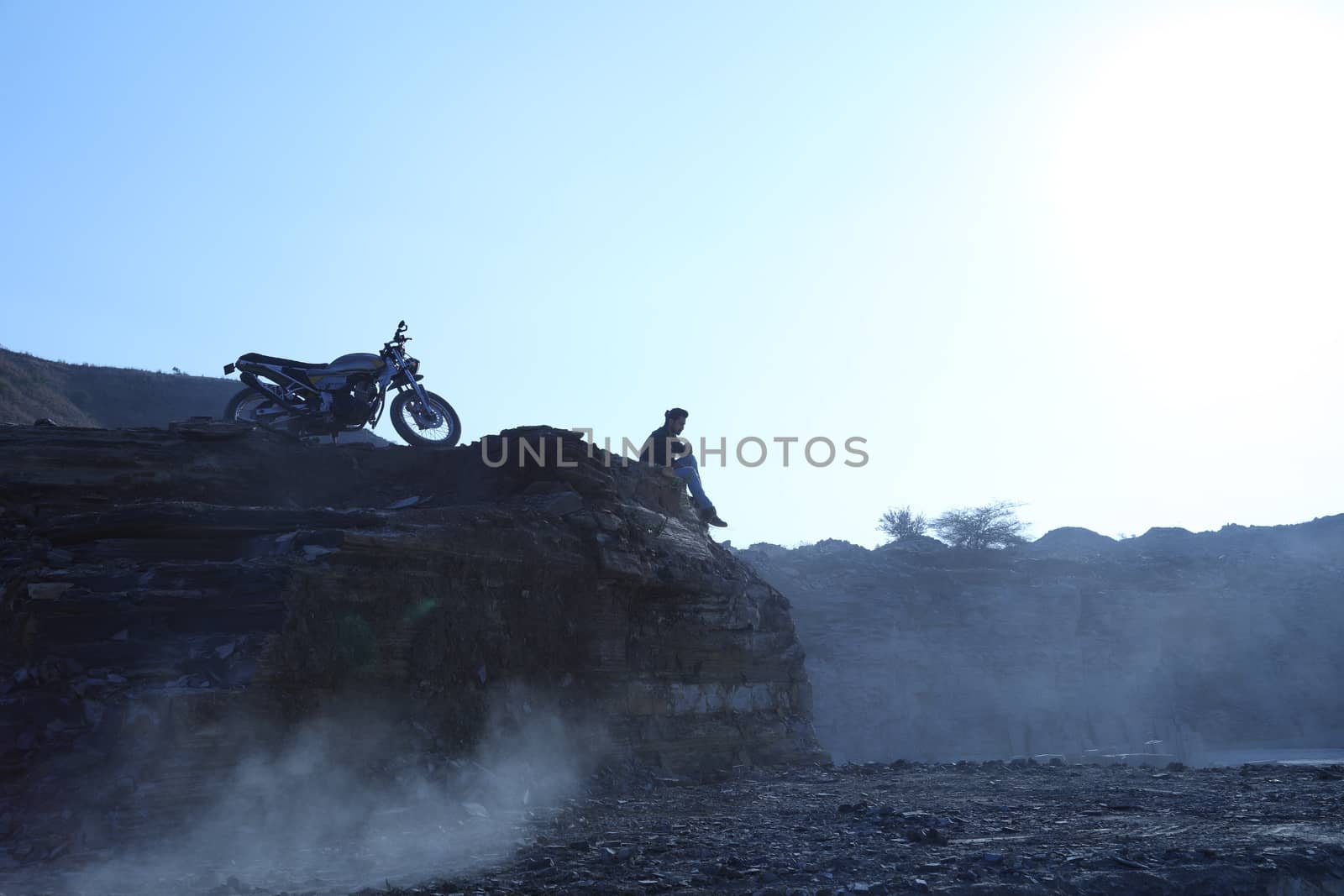 Silhouette of people on hill