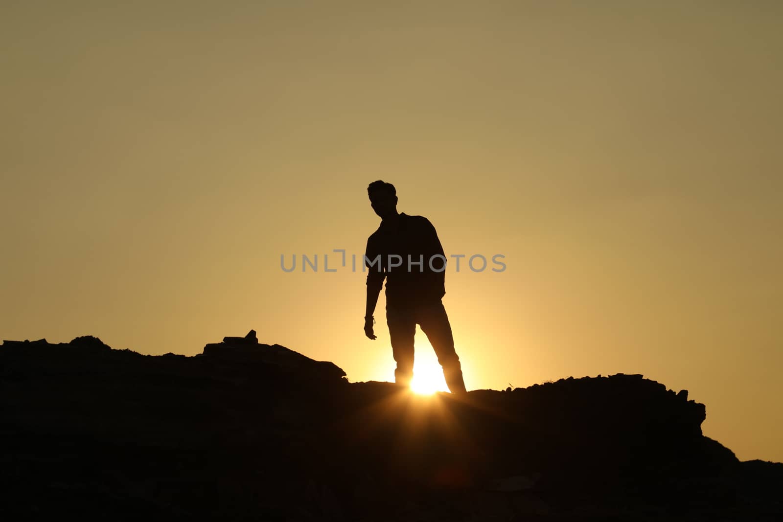 Silhouette of people on hill