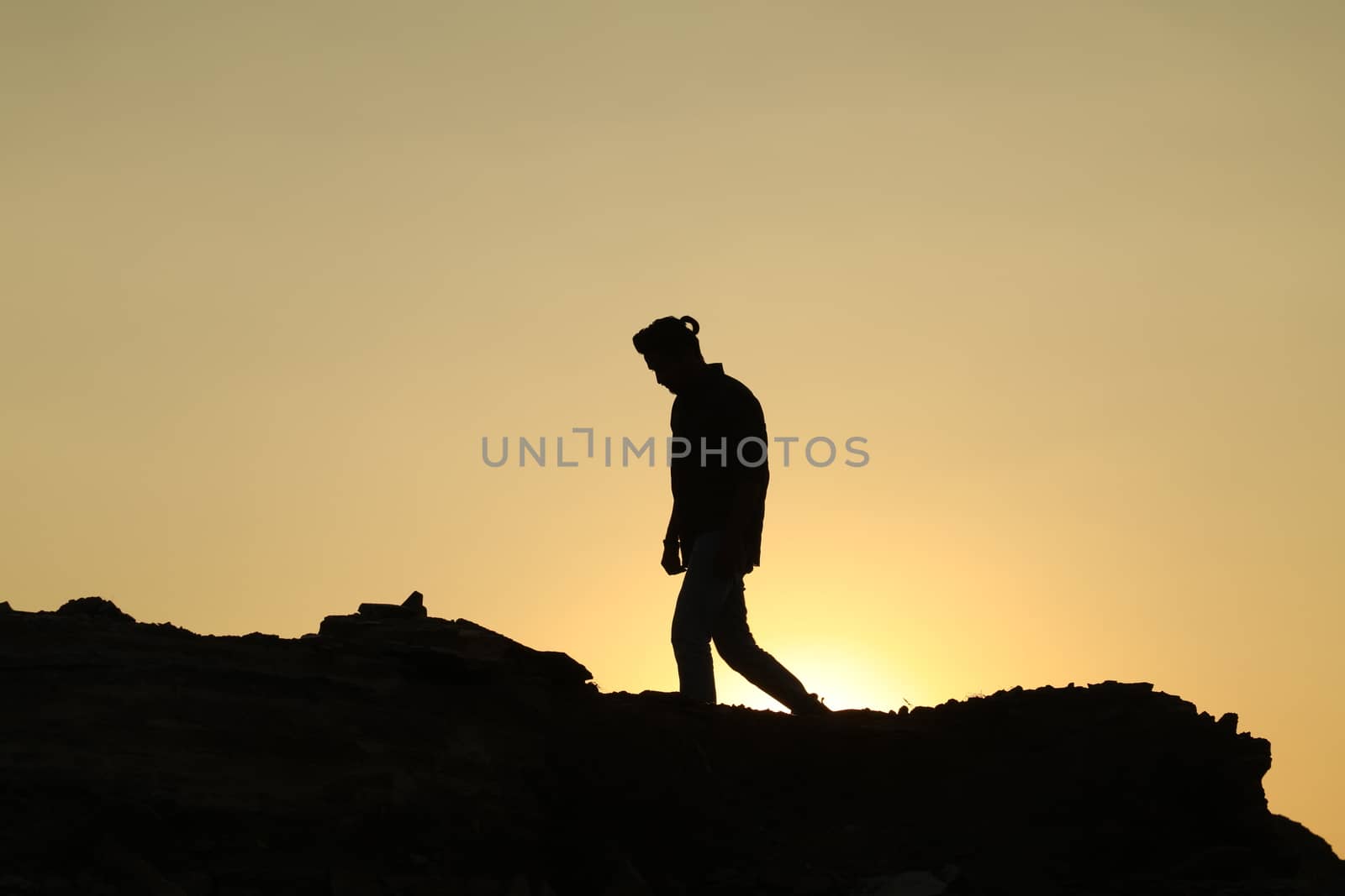 Silhouette of people on hill