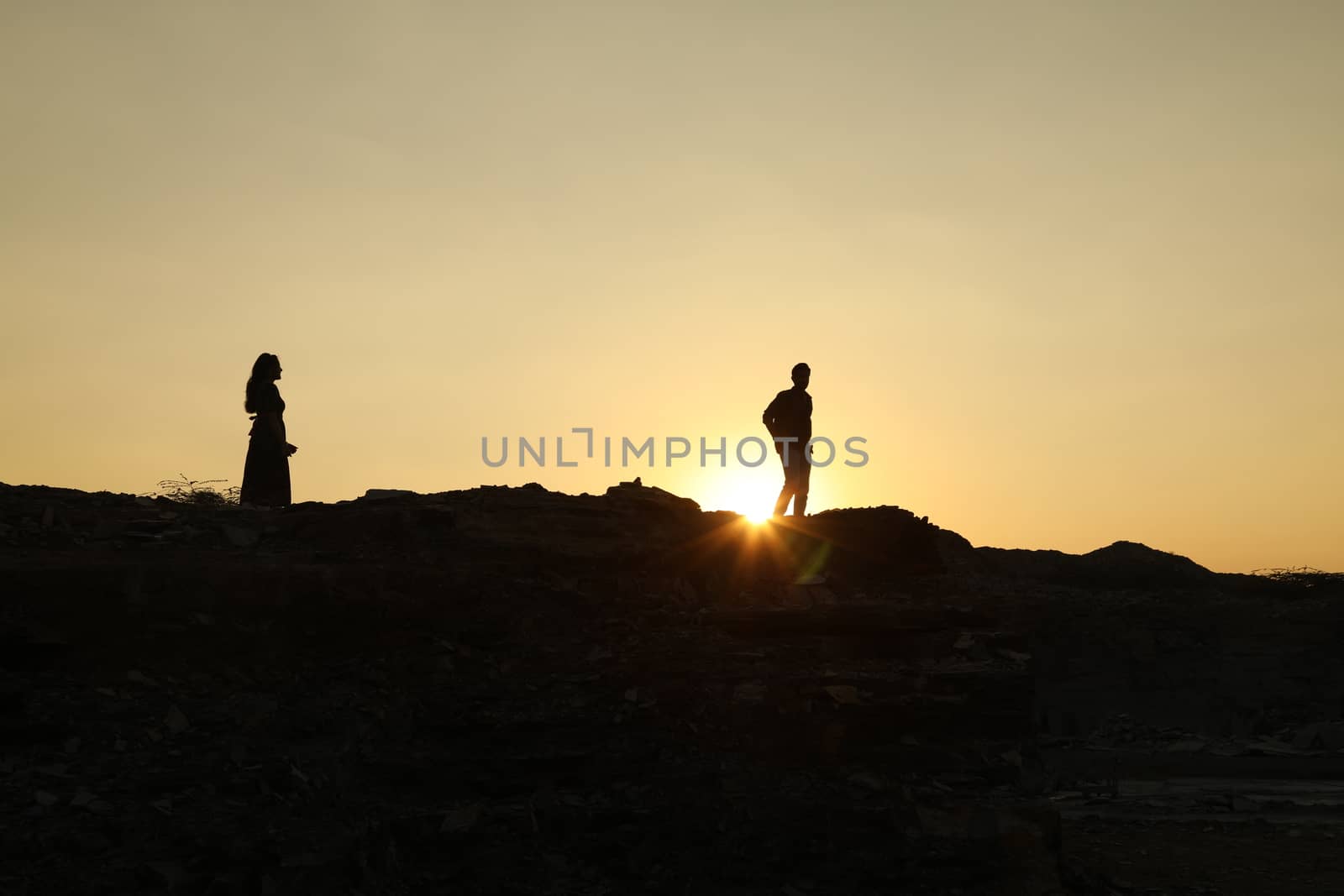 Silhouette of people on hill