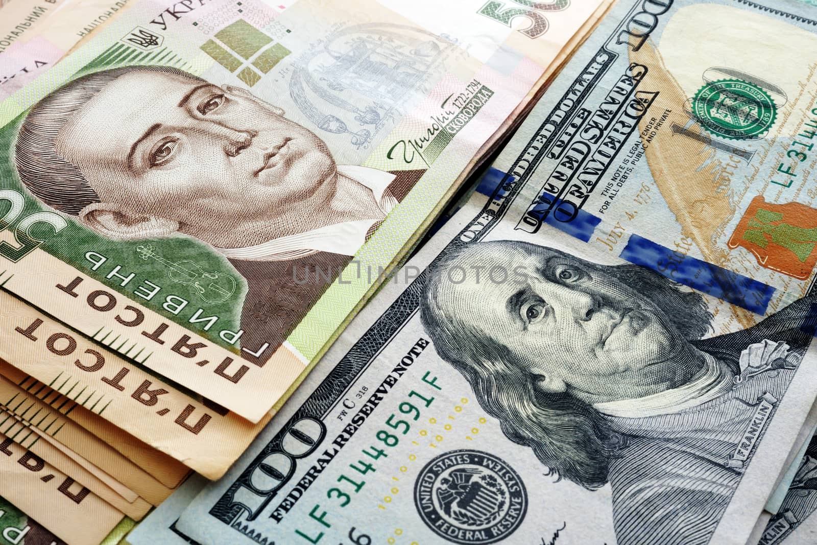 Ukrainian cash hryvnia and dollars USA. Currency exchange rate.