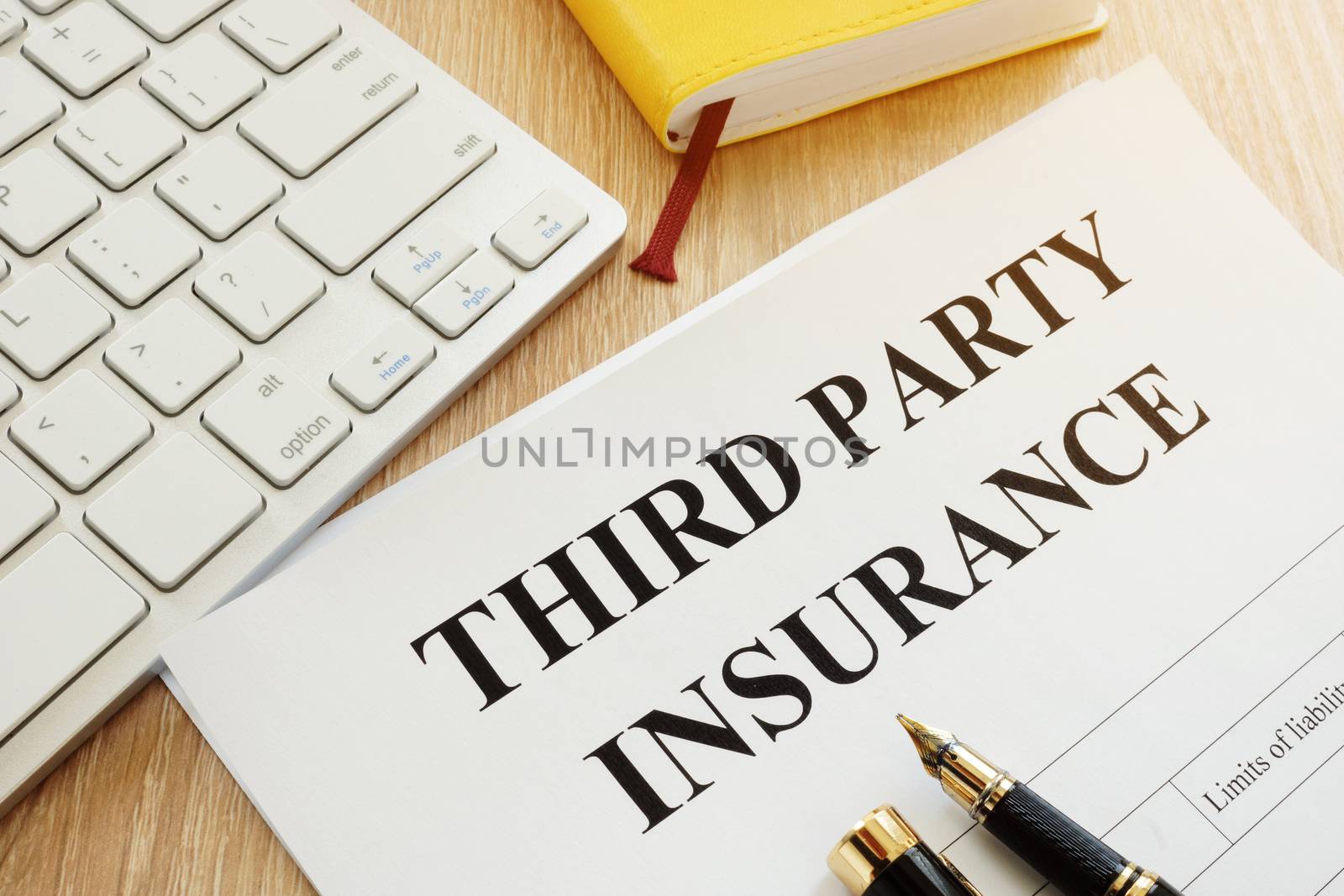 Third Party Insurance form on a desk.