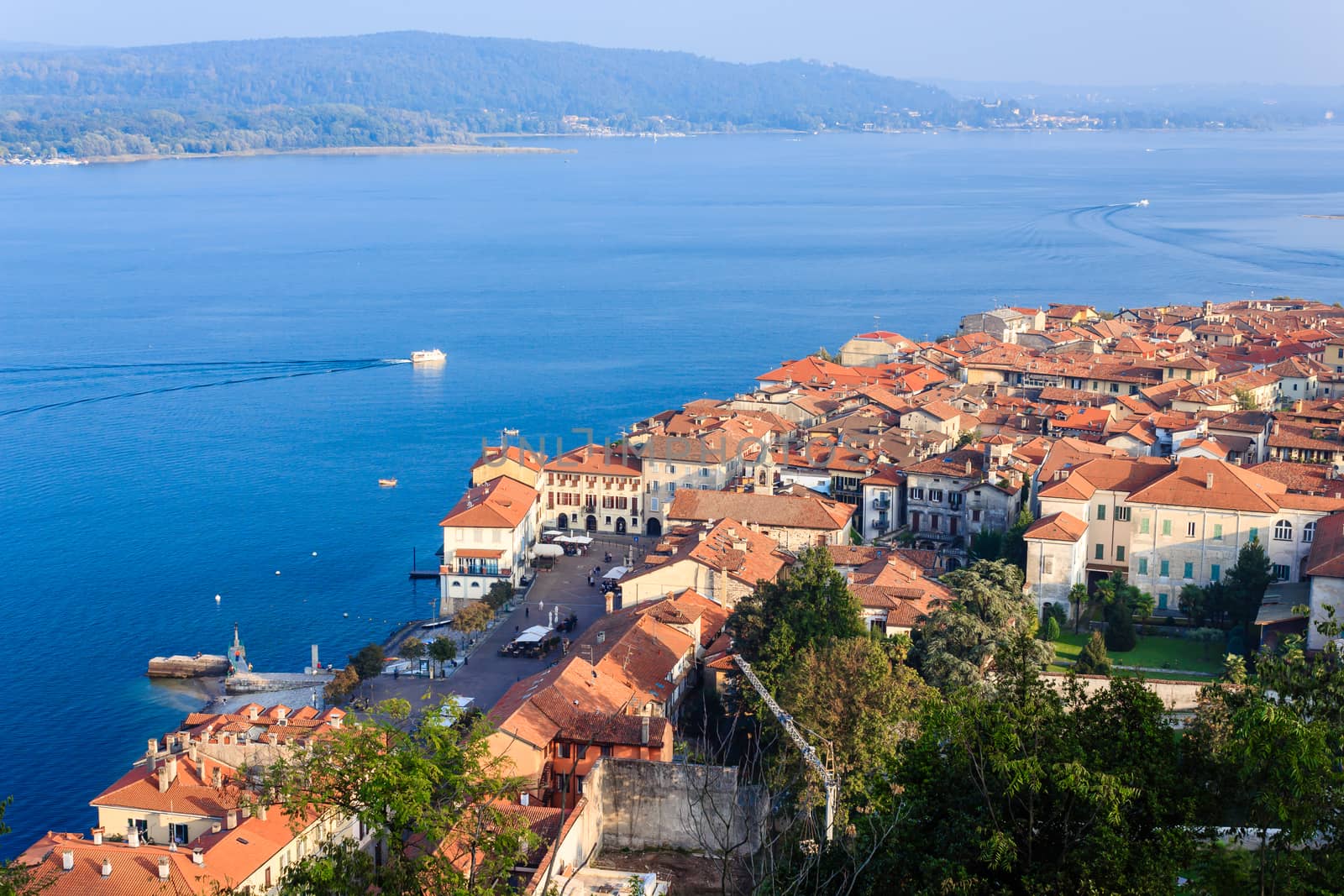 panoramic view of the city of Arona and Lake  Maggiore with in the background the Lombardy region