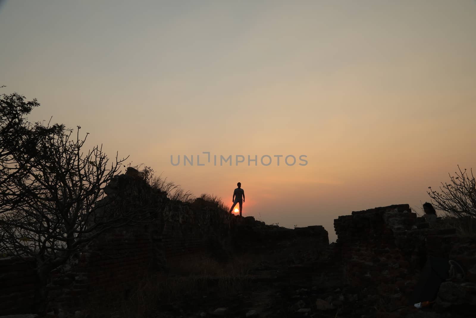 Silhouette of people on hill