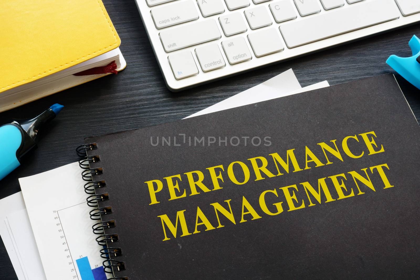 Performance management documents on an office table.
