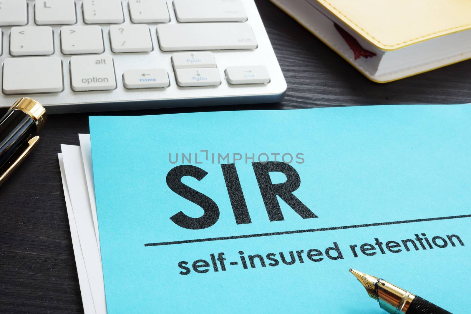Self-insured retention SIR insurance on a desk.