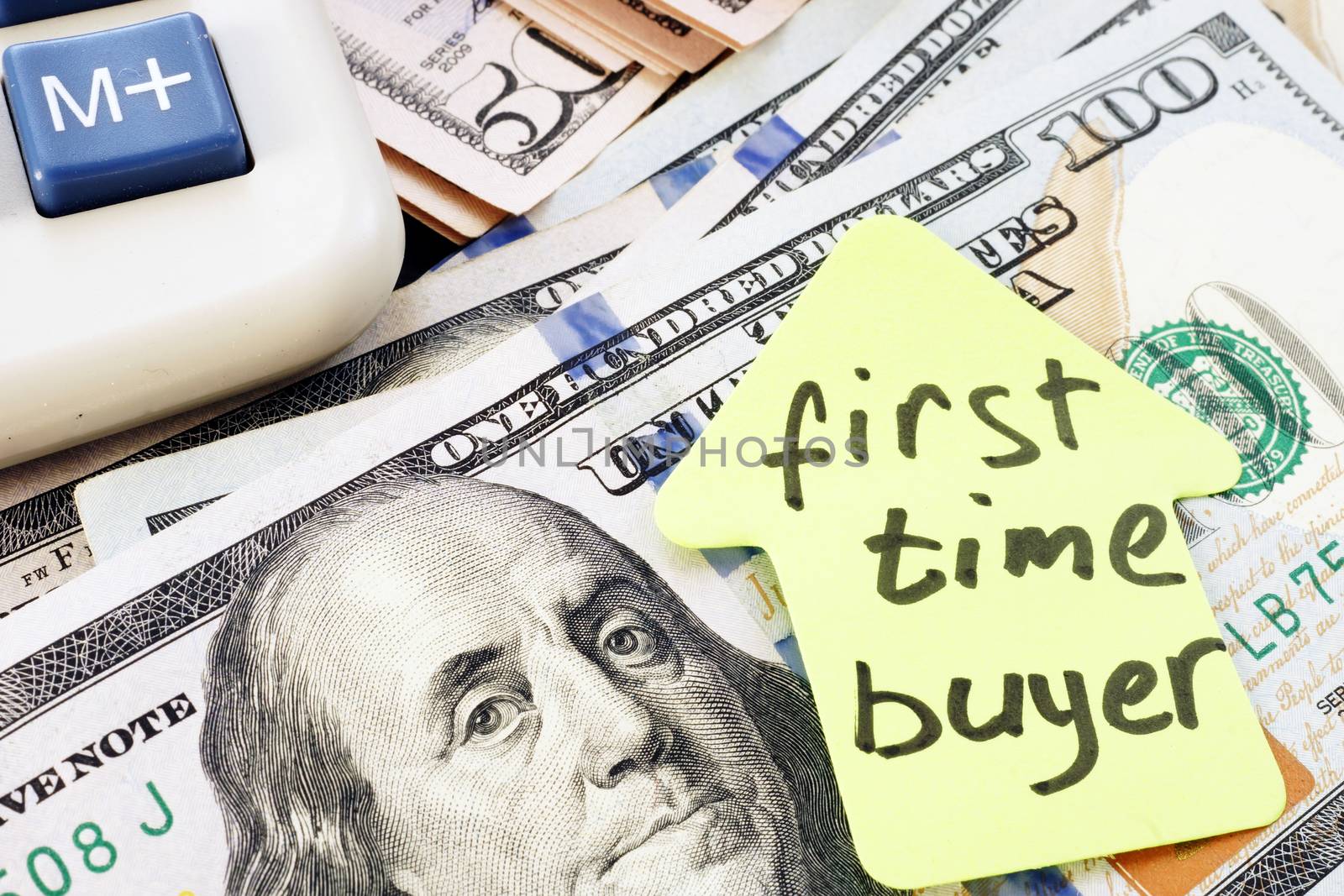First time buyer written on a piece of paper. Real estate.