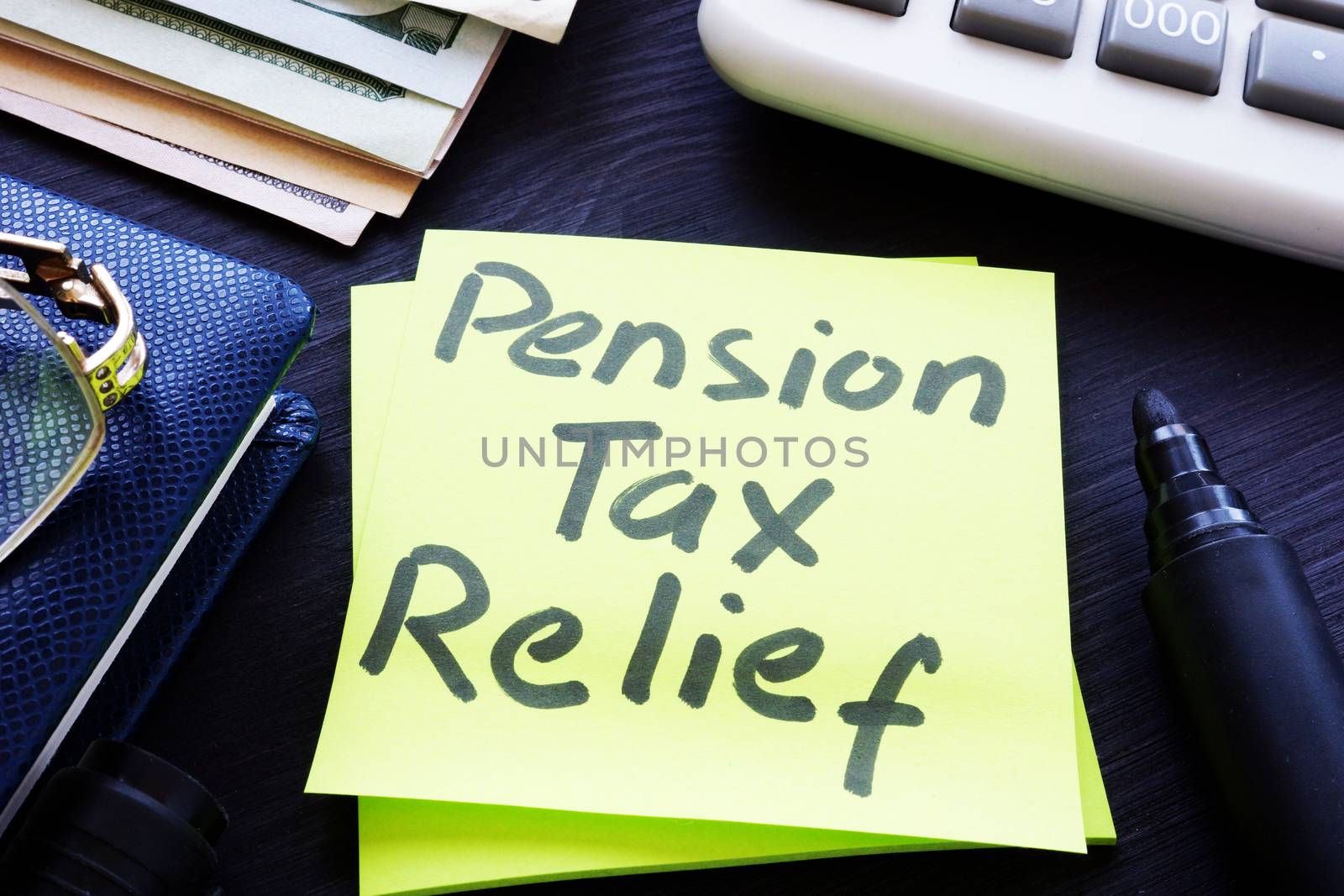 Pension tax relief written on a stick.