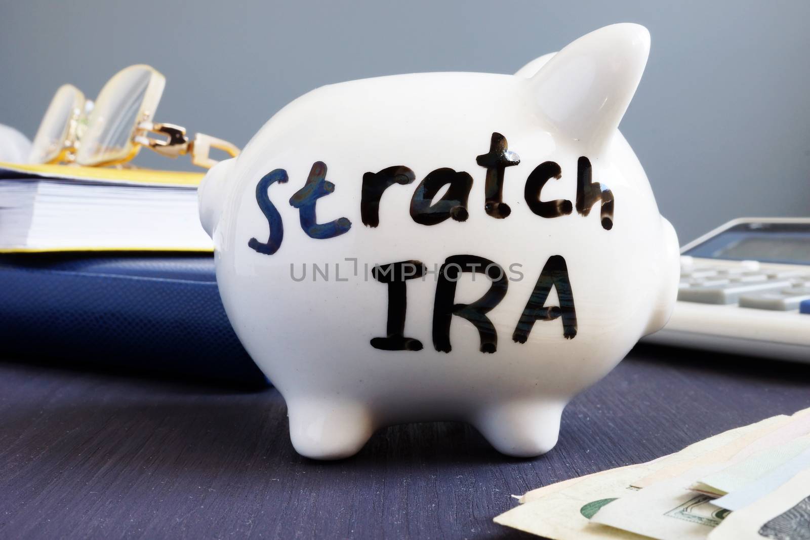 Stretch ira written on a piggy bank. Retirement.