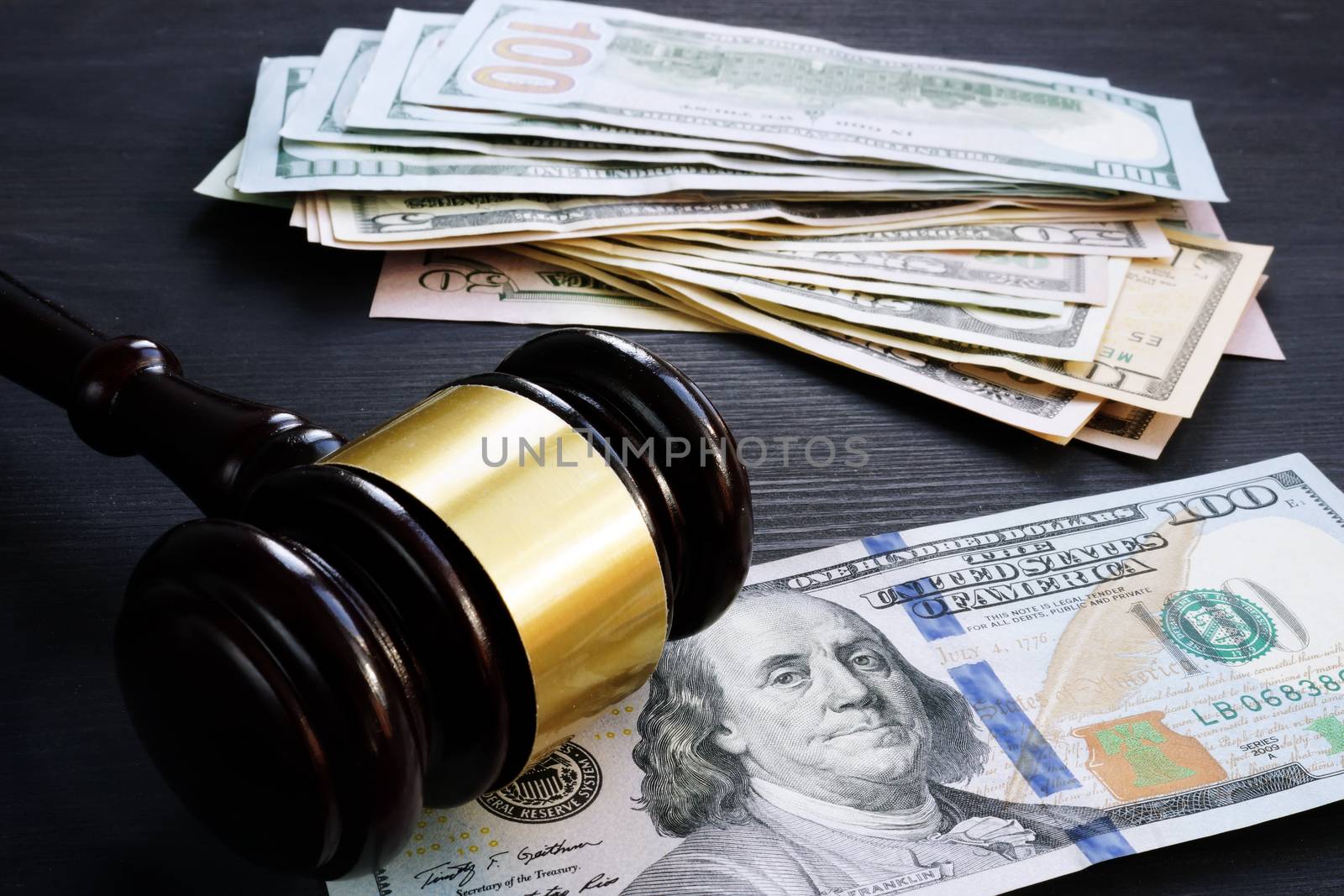 Bail bond and financial penalty. Gavel and money.