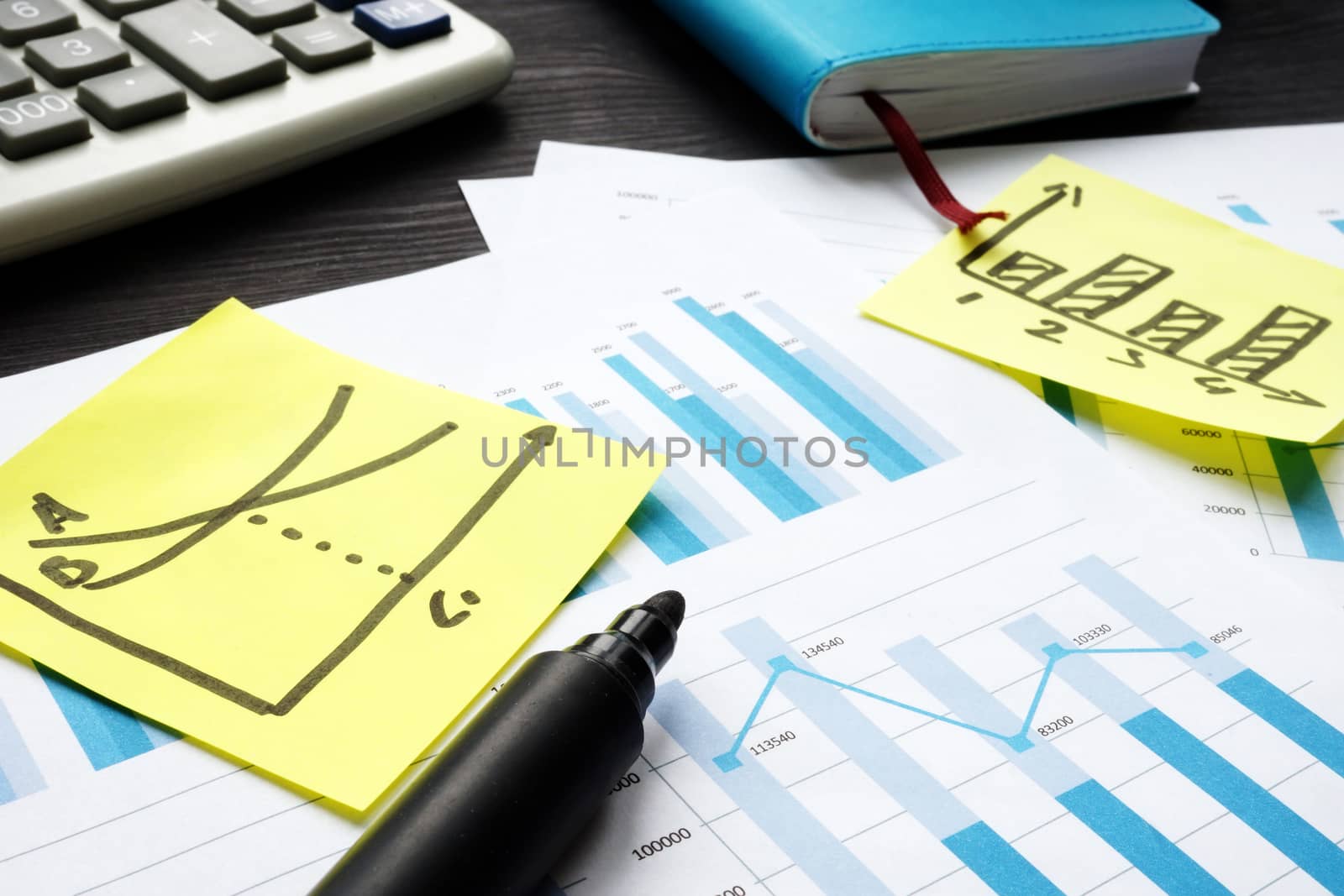 Business market analysis. Financial documents and charts in the office.