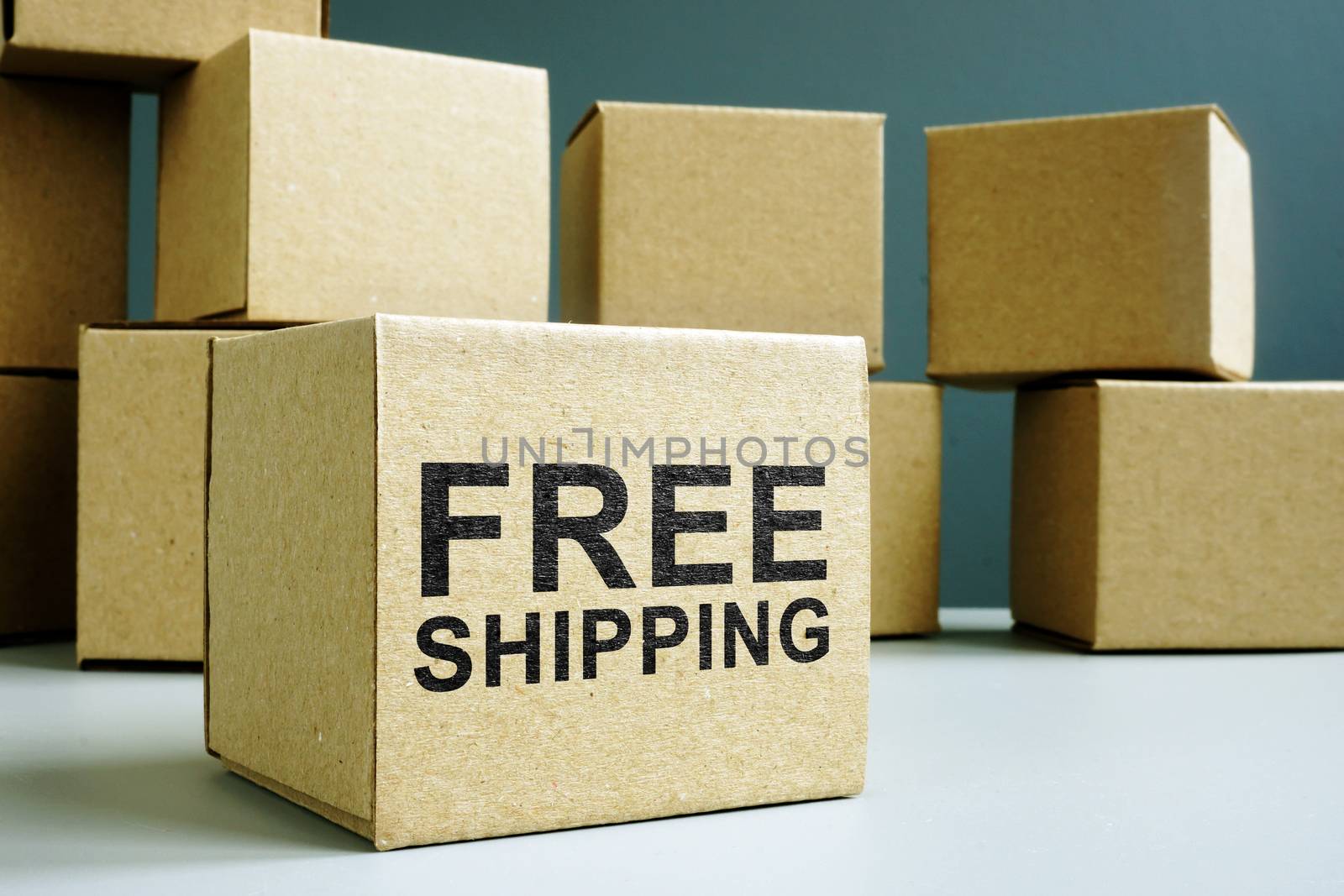 Free shipping sign on a cardboard box side.