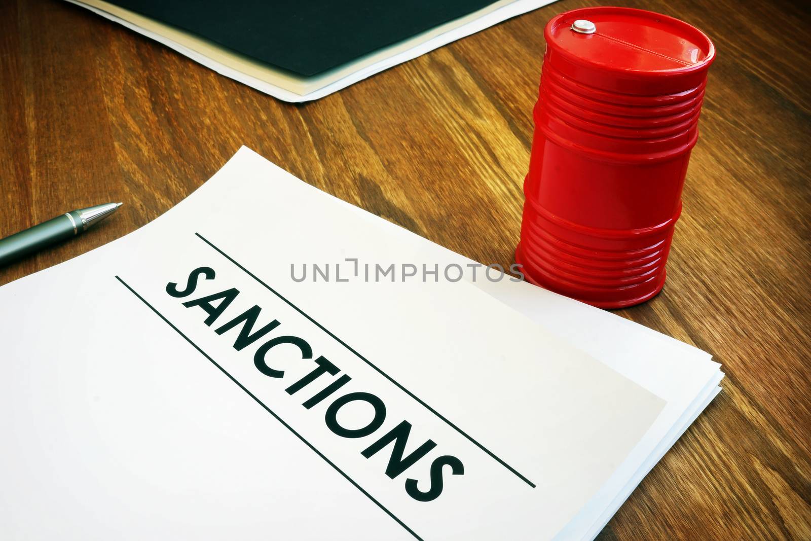 Sanctions list with model of oil barrel.