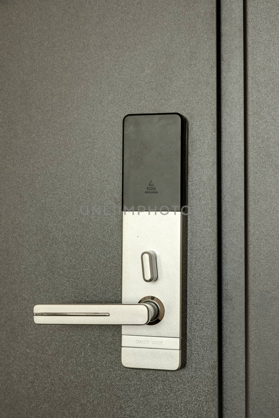 the front door with a door handle by sveter