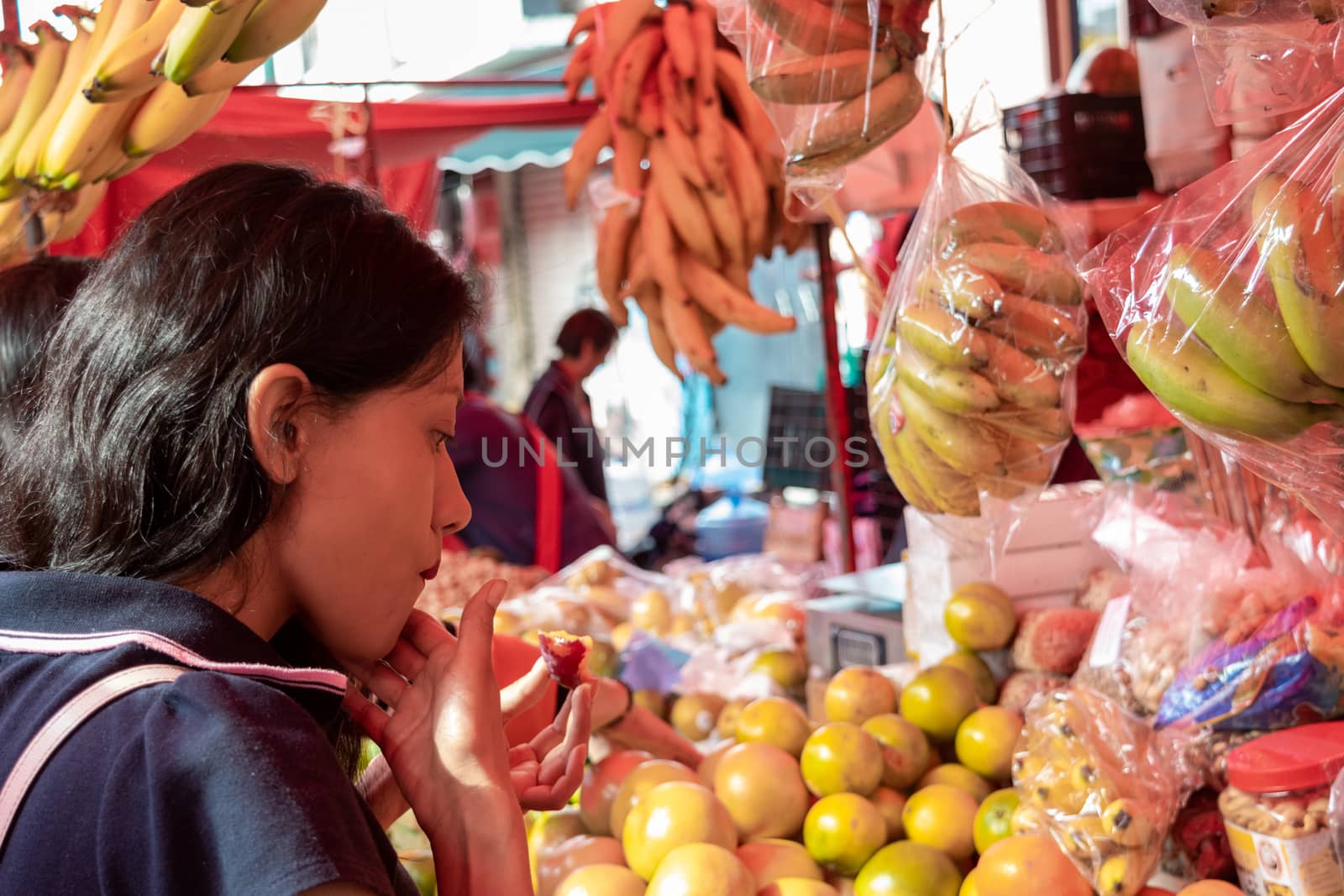 Woman buying some vegetables and fruits by Tonhio