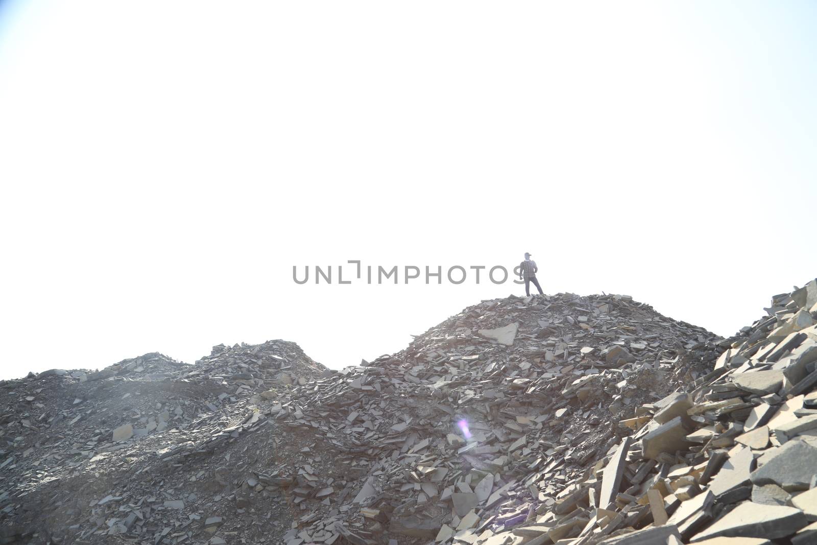 Silhouette of people on hill