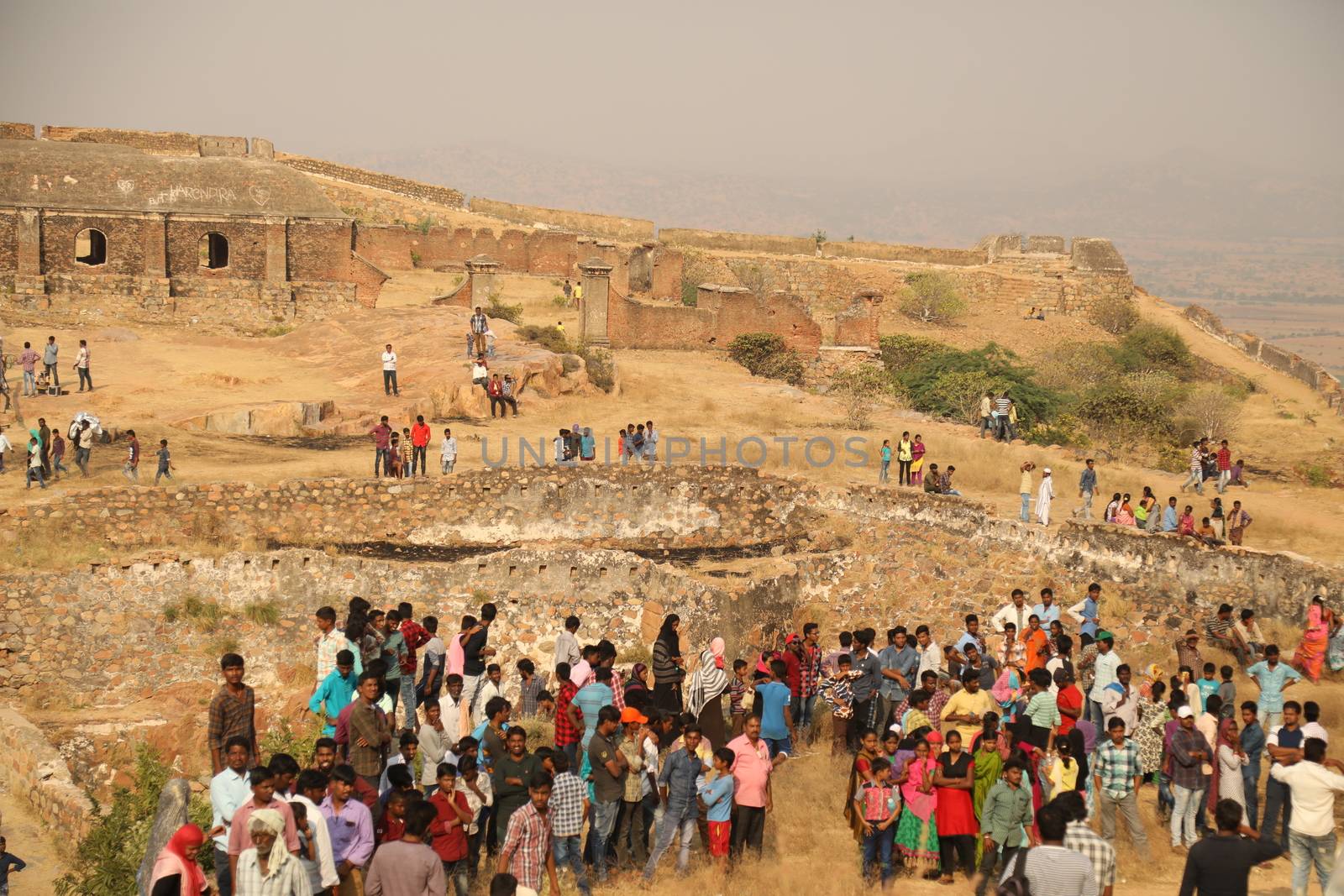 Silhouette of people on hill