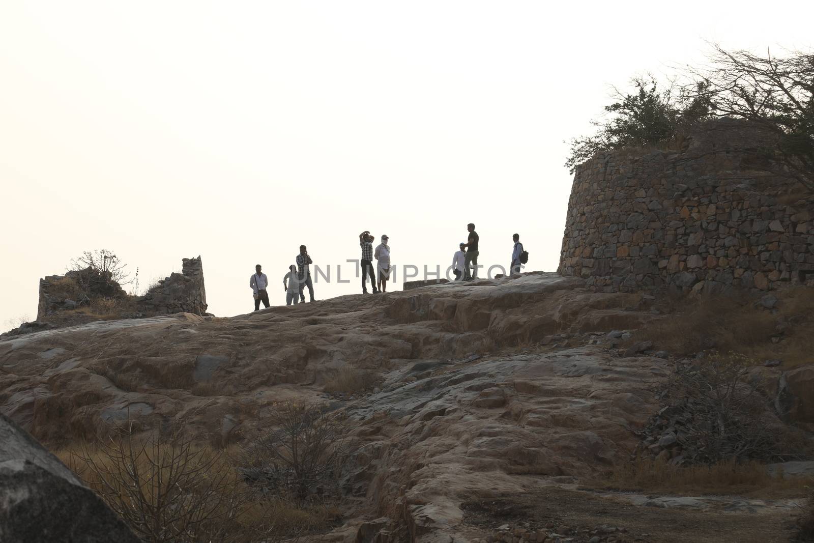 Silhouette of people on hill