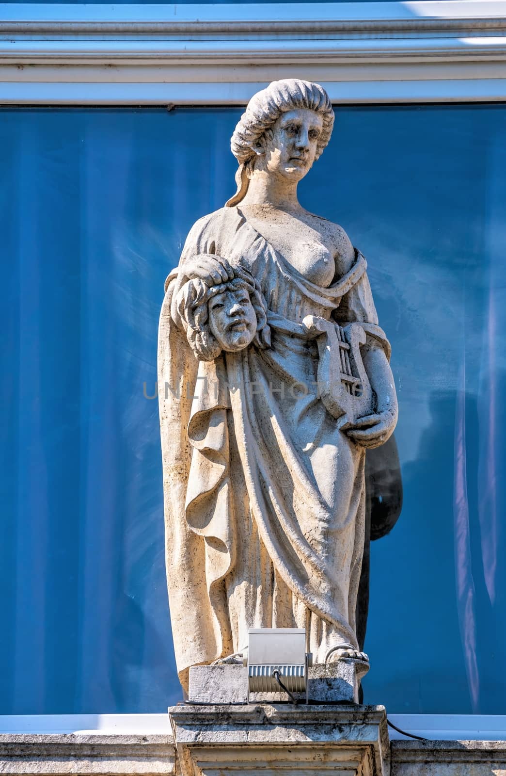 Ruse, Bulgaria - 07.26.2019. Sculpture on the roof of an old historical building in Ruse, Bulgaria, on a sunny summer day