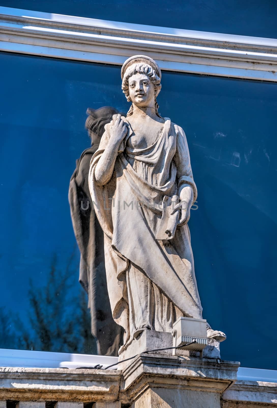 Ruse, Bulgaria - 07.26.2019. Sculpture on the roof of an old historical building in Ruse, Bulgaria, on a sunny summer day