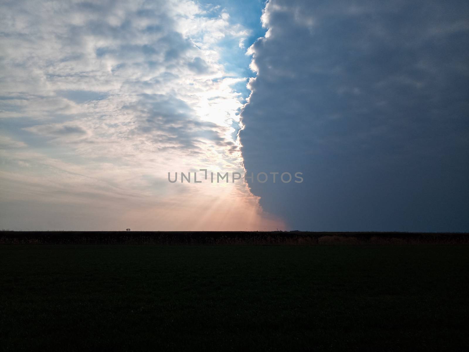 The boundary of atmospheric fronts. The sharp boundary of the clouds in the sky.
