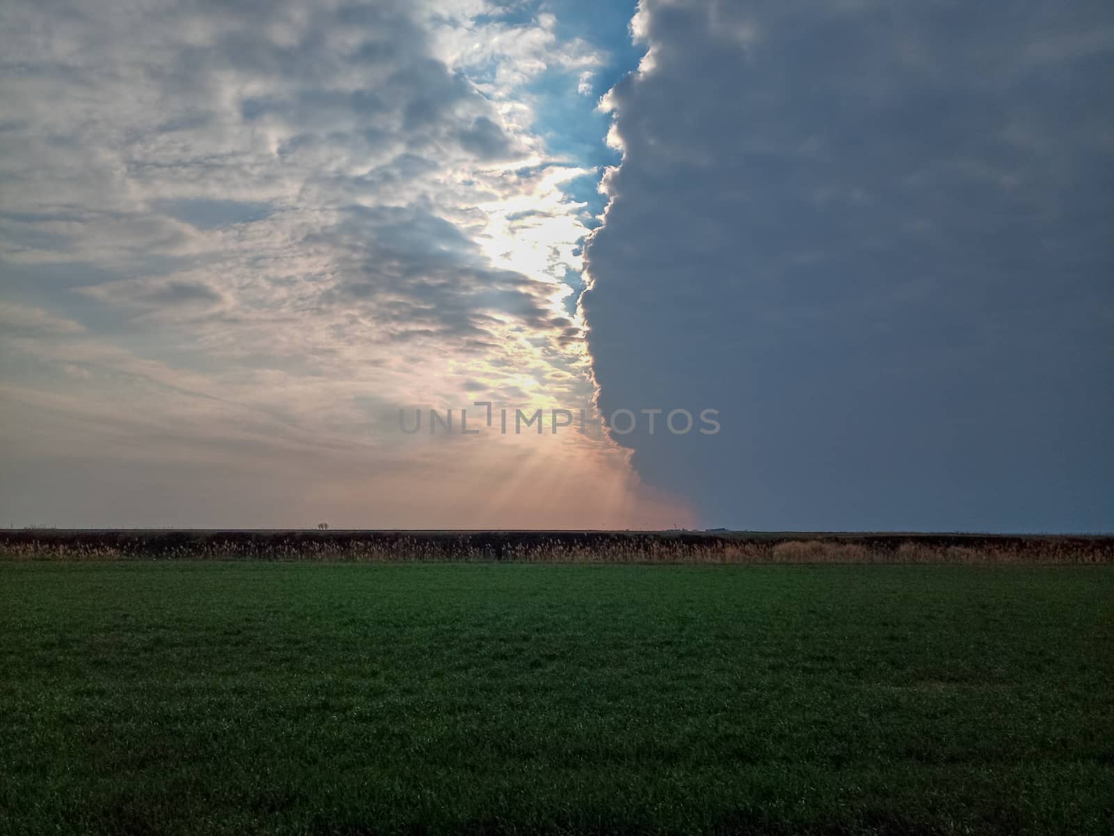 The boundary of atmospheric fronts. The sharp boundary of the clouds in the sky.