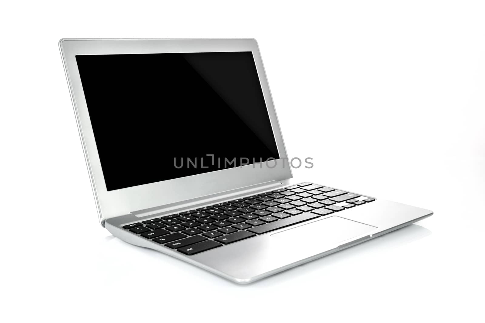 Mock up of a luxury and modern generic laptop in a metal case in close-up on a white background.