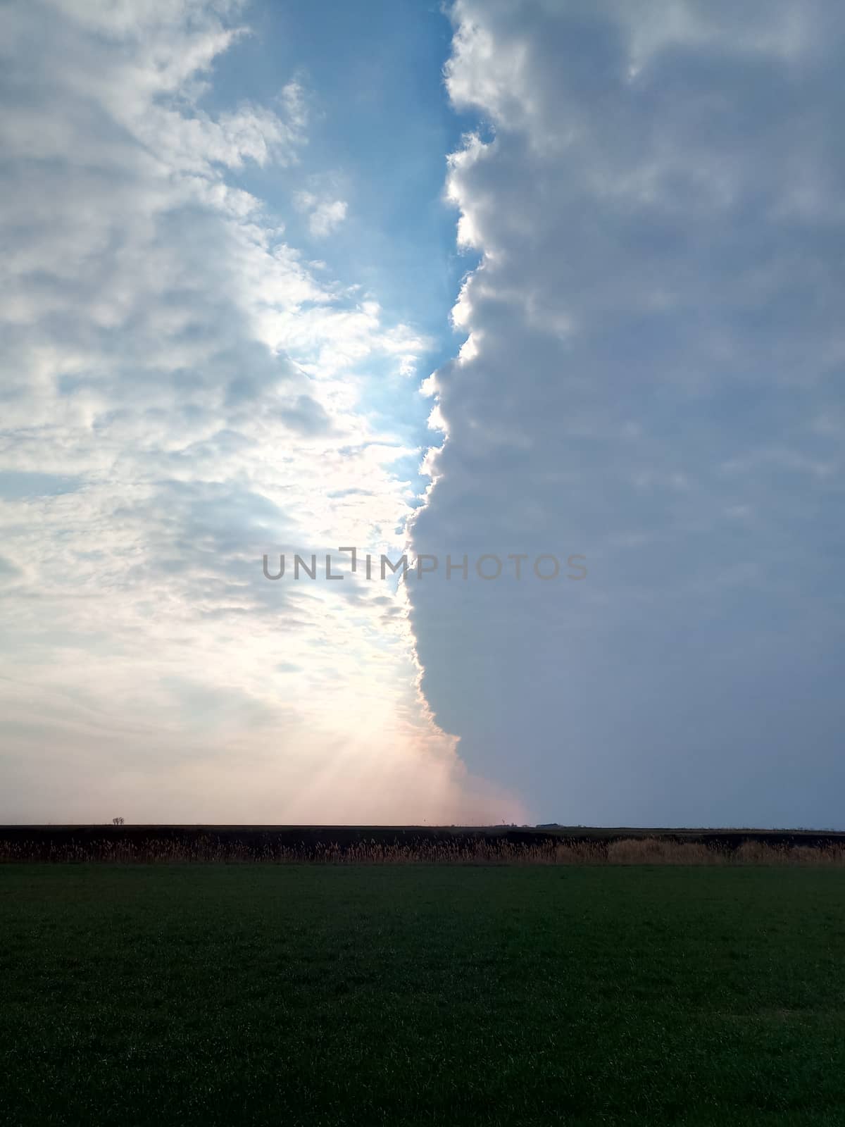 The boundary of atmospheric fronts. The sharp boundary of the clouds in the sky.