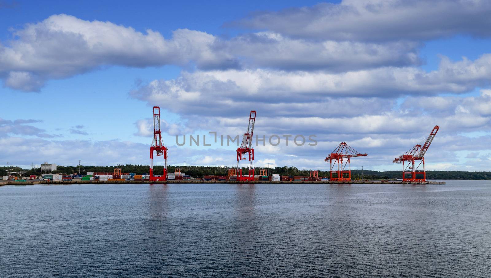 Heavy shipping cranes at a freight yard on the coast near Halifax, Nova Scotia, Canada