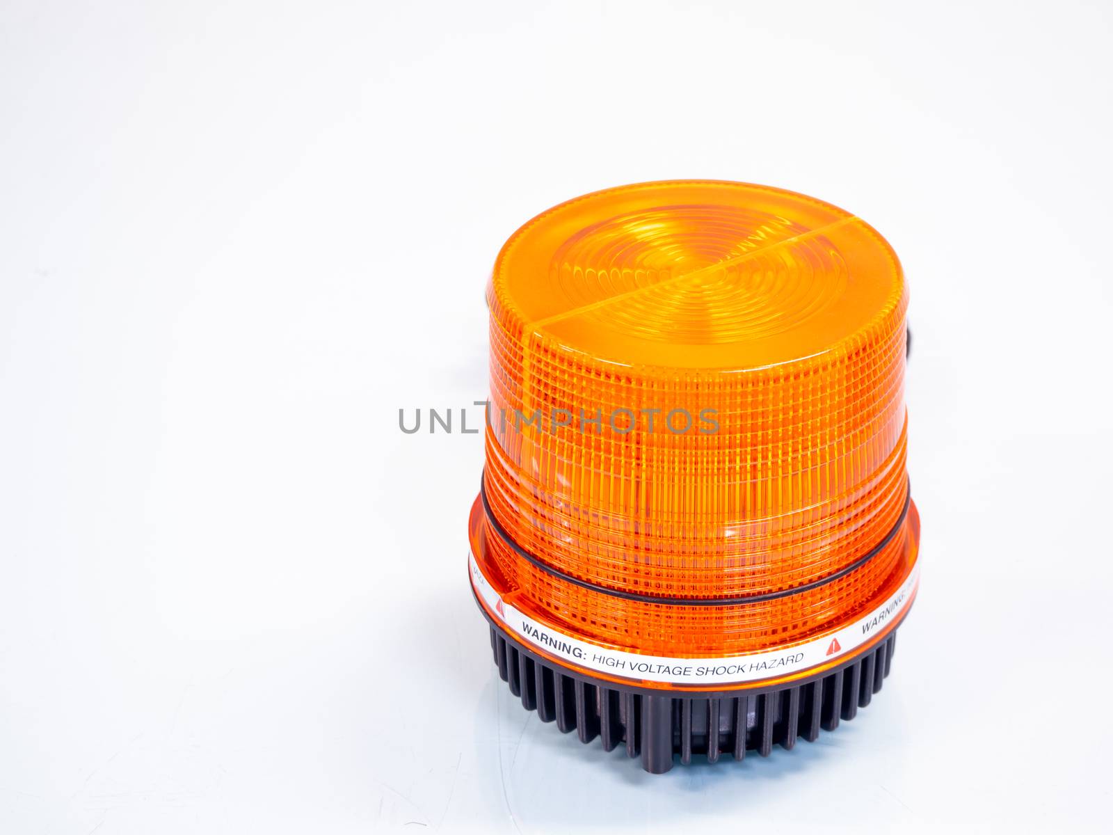 the Orange rotating beacon on white reflective background.