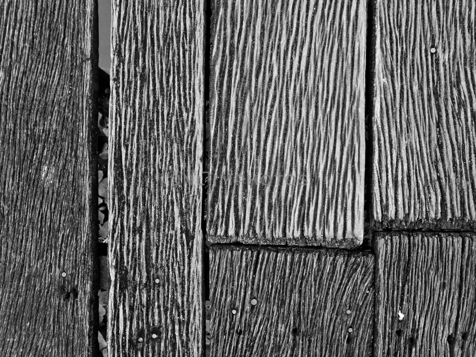 Grooves and patterns of the hardwood bridge across the canal