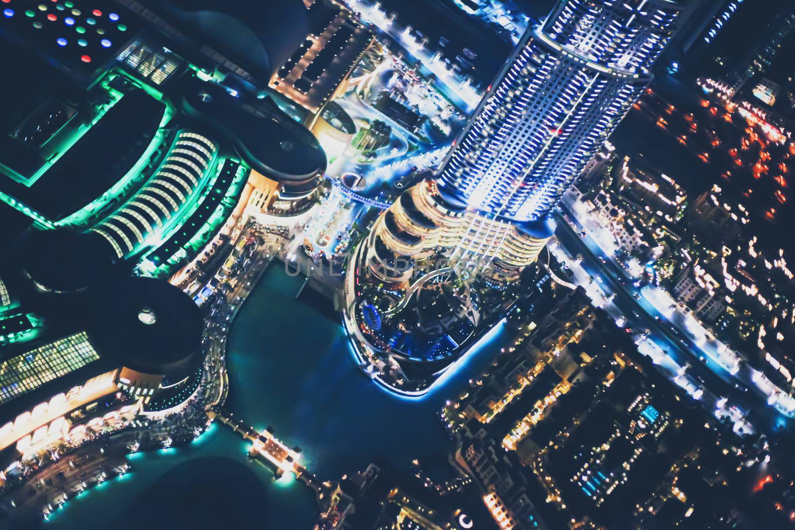 Aerial night view of Dubai in United Arab Emirates, metropolitan cityscape scenery