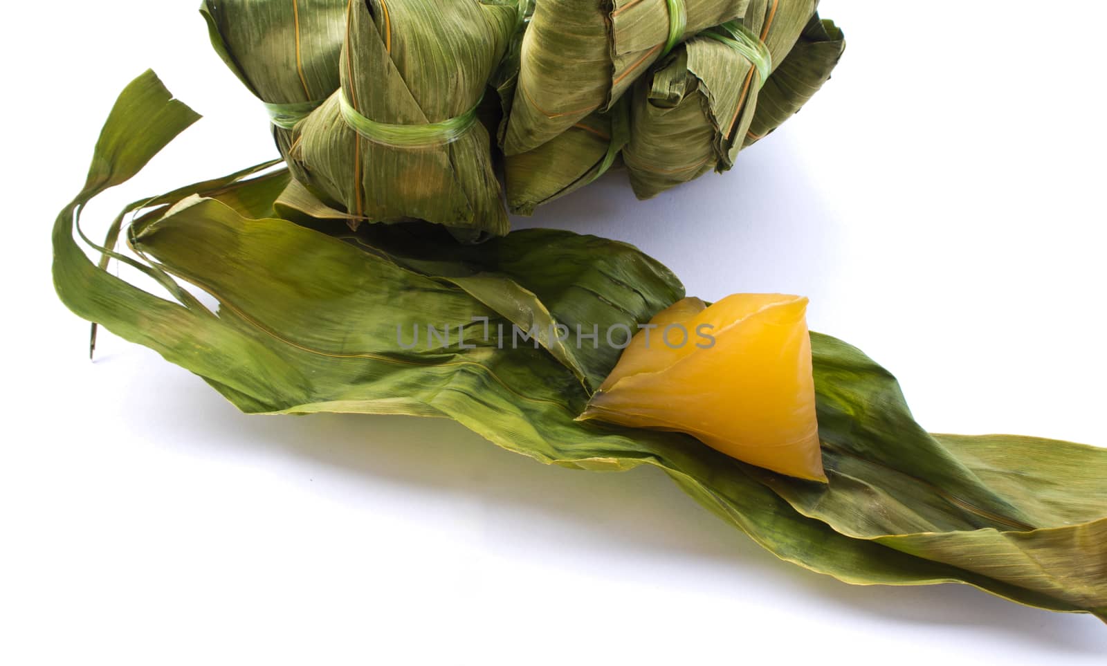 Steamed glutinous rice wrapped in bamboo leaf