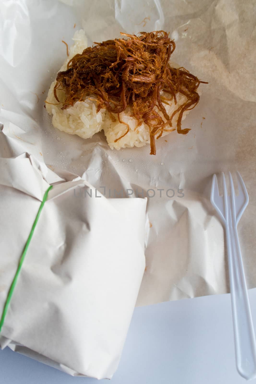 Sticky rice and Roast pork in paper wrap