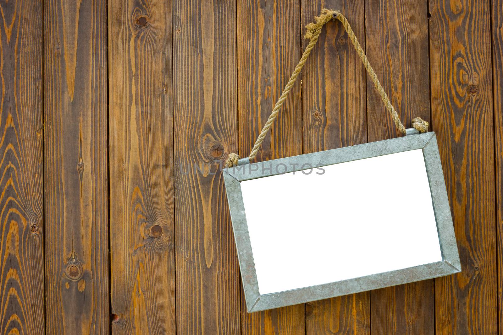 white space blackboard with rope on wooden door of a coffee shop. Copyspace on the left. Isolated. Clipping path