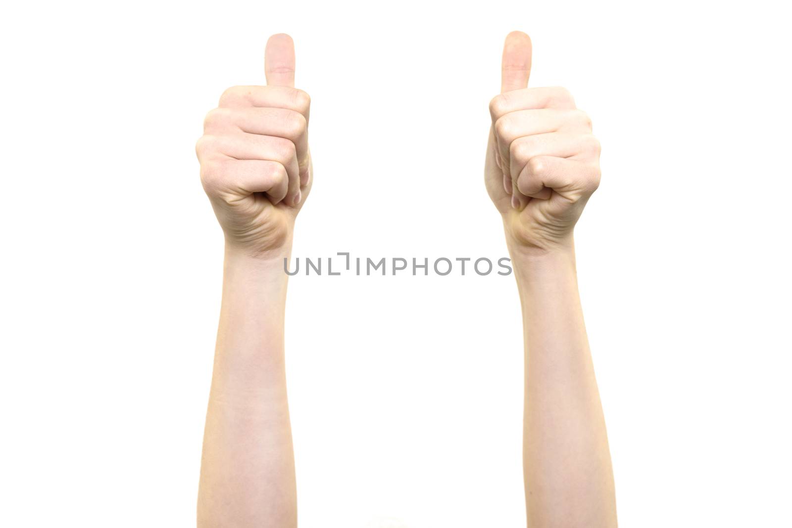 Woman is holding two thumbs up into the air on a white background