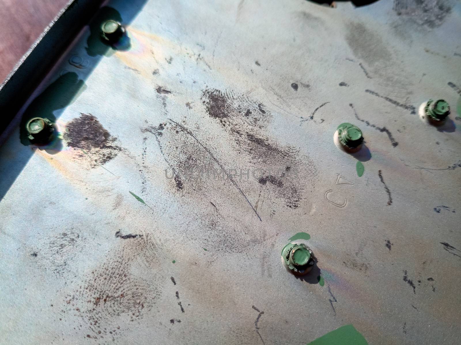 Fingerprints on the steel surface. Fingerprints of dirty hands.