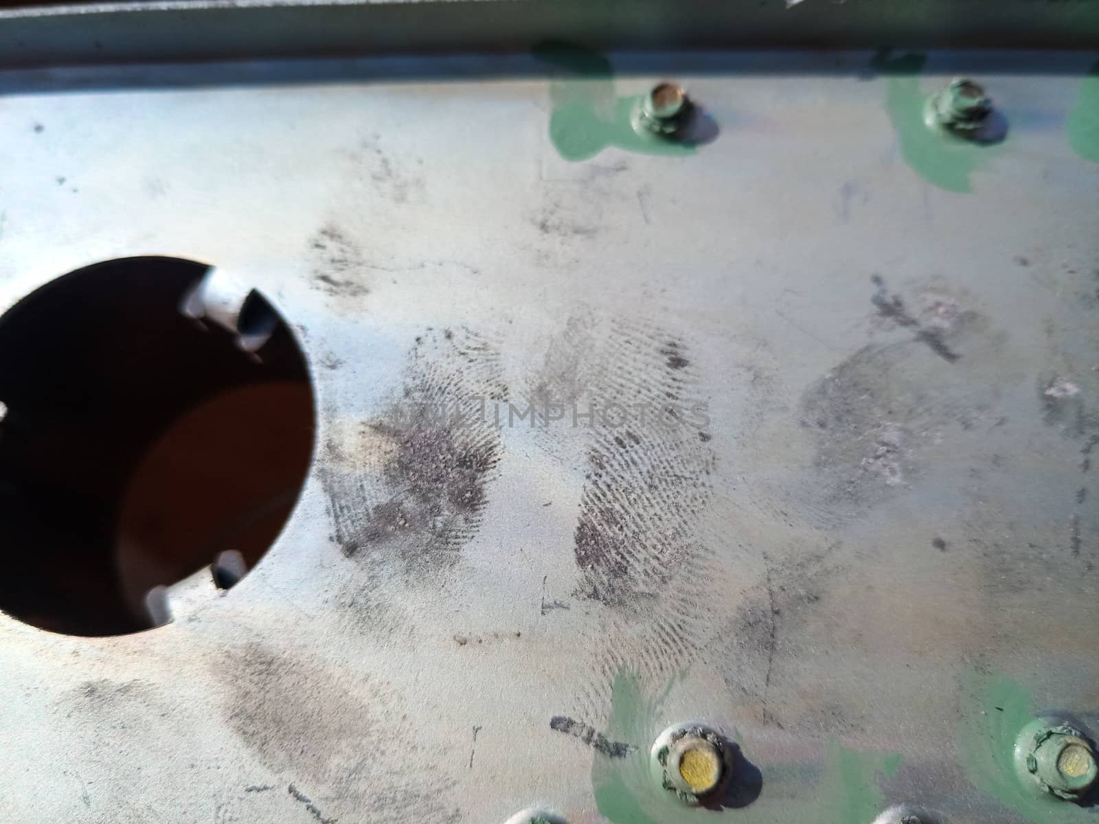 Fingerprints on the steel surface. Fingerprints of dirty hands.